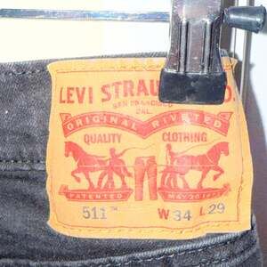 LEVI DOUBLE BLACK 511 JEANS 34 / 29 STRAIGHT CUT
